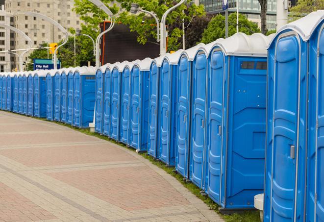 a row of portable restrooms for a special event, ensuring guests have access to clean facilities in Byron, CA